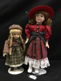 Pair Of Contemporary Porcelain Dolls Are 12