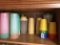 Cabinet Shelf Of Tupperware Glasses As Shown