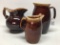 (3) Hull Brown Ovenware Pitchers