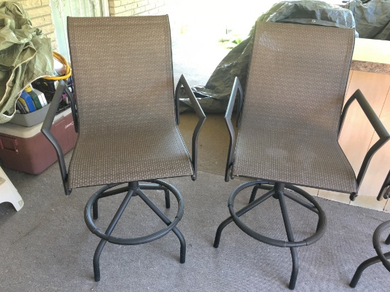 4 Swivel Cast Aluminum Bar Stools Are 45" Tall