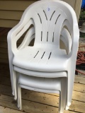 (4) White Plastic Outside Chairs