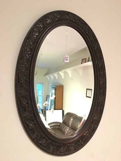 Embossed Composition Oval Beveled Mirror Is 23" W. x 34" T.