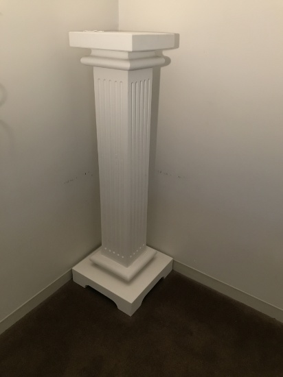 Wooden White Pedestal Measures 44" tall.