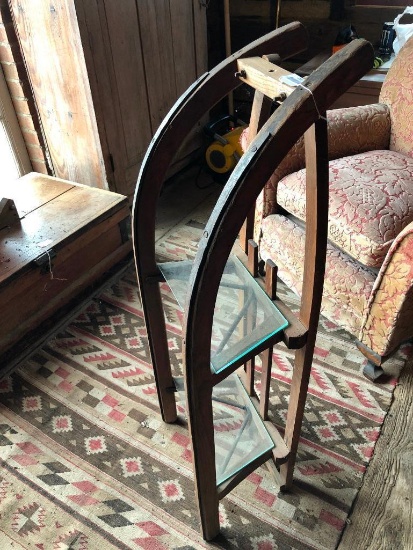 Antique sled converted to shelving unit