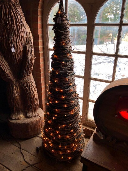 Grapevine tree with white twinkle lights.