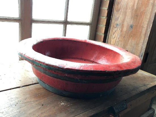 Very large bowl that appears to made out of a wagon wheel hub
