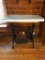 Singer Trettle Sewing Machine Base with Glass Over Marble Top Over A Wood Top,