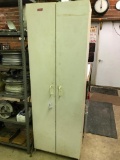 Particle Board, Double Door Cabinet and Contents! 70 Inches Tall and 2 Feet Wide
