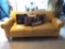 Mustard/Yellow, Two Cushion Sofa with Pillows, 74 Inches Wide, 3 Feet Tall, Some Lighter Wear.