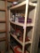 Plastic Shelving Unit of Tools, Cords, Caulk and More