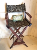 Director Style Chair with Leopard Print Fabric, It shows some wear from use.