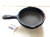 A Cast Iron Wagner Ware 0 Skillet and an Unmarked Skillet