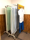 Two Divider Screens, Timberland Poduct Rack and A Uniform