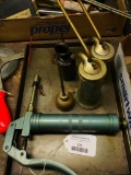 Four Vintage Oil Cans and One Grease Gun