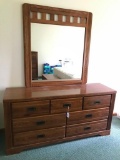 Oak finish Dresser with mirror, 62 inches wide and 30 inches tall