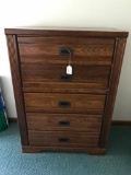 Oak finish chest of drawers, 4 feet tall and 34 inches wide