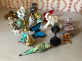 Group of Figurines, Bells and a Candle Stick