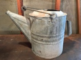 Vintage Watering Can with a Few Holes in the Bottom