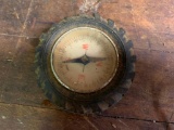 Vintage Compass In A Tire Wheel