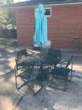 Wrought Iron Patio Table with 4 Chairs and an Umbrella
