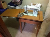 VVintage Sewing Machine In Cabinet