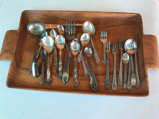 Group of Spoons on Wood Tray