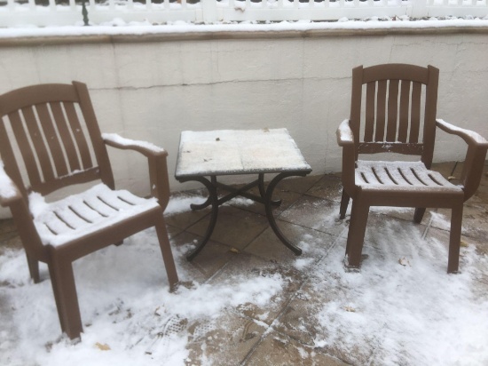 Outdoor Plastic Chairs and a Tile Top Table