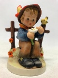 Hummel Figurine: Boy Picking Daisies By Fence