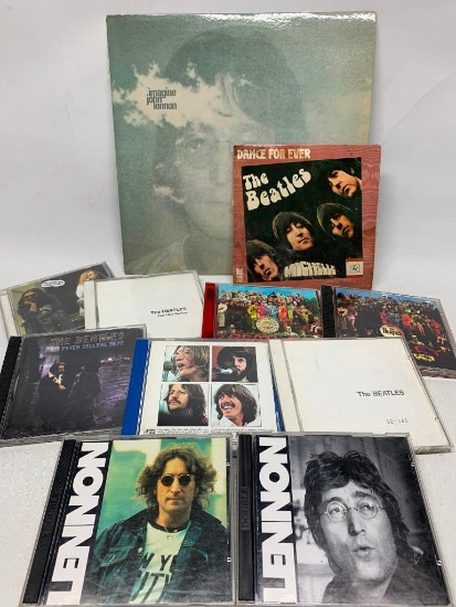 7 Beatles Cds, 2 Lennon Cds a Rough 45 RPm of Michelle and a Rough 33 RPM of Imagine by Lennon