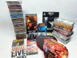 Group of 40 Loose Nirvana CDs, CD Sets, Books and More