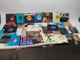 You are getting what is pictured in the lot. It appears to have various genres! The records are also