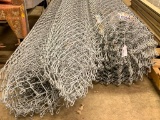 Two Rolls of 10' Tall Chain Link Fence a Roll of 12' Tall Fencing