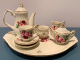 Child's Porcelain Miniature Tea Set For Two