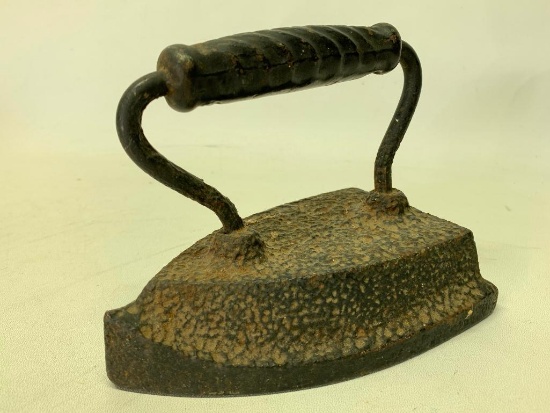 Antique Sad Iron, Adams and Peckover is on the Top of the Handle
