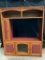 Very Large Oak Entertainment Center with a Maroon Color Accent