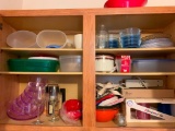 Group of Plastic Ware in Laundry Room Cabinet