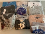 Approx.10, New in Package XS, Ladies Shirts, Some lots may also include hoodie or sweater. Items are