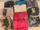 Approx.10, New in Package XS, Ladies Shirts, Some lots may also include hoodie or sweater. Items are