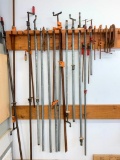 Large Group of Wood Clamps Hanging on the Wall