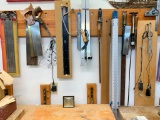 Group of Saws, T-Rules and More Hanging on Wall as Pictured