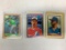 1991 Bowman Ken Griffey Jr Card, 1988 Leaf Randy Johnson Donruss Card and 1987 Topps Mark McGuire