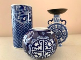 Two Chinese Blue and White Porcelain Candle Holders and a Vase