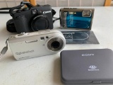 Group of Digital Cameras as Pictured