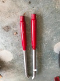 Set of What Appear to Be Cherry Bomb Mufflers with Exhaust Pipe Pictured