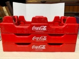 Group of Plastic Coca-Cola Trays