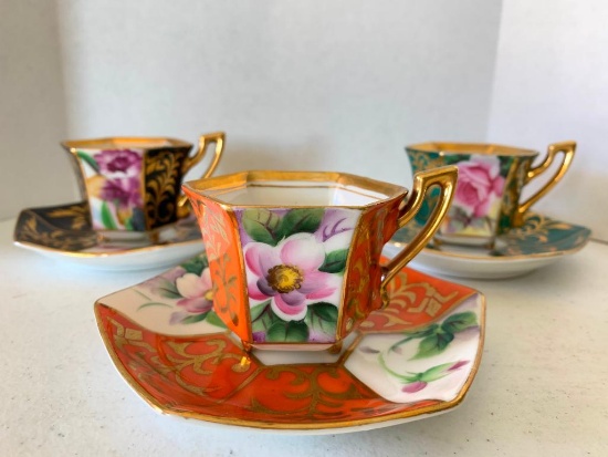 Three Porcelain Tea Cups and Saucers