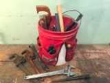 Bucket with Pipe Wrenches and More Tools
