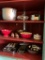 Cabinet in Kitchen of Pots, Mixing Bowls and Pans as Pictured
