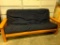 Full Size Futon with Wooden Frame, It has Hidden Arm Storage and Magazine Rack Sides