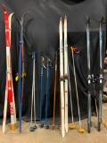 Group of Snow Skiis and Poles